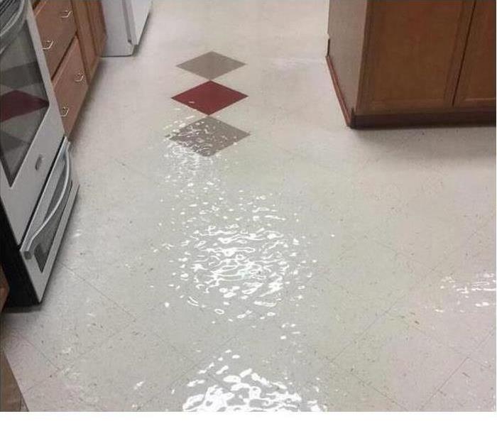 Kitchen from local church covered in two inches of water