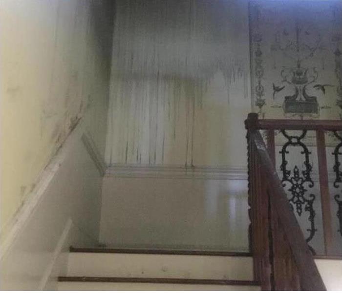 home with smoke damage on walls after a fire 