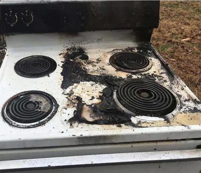 kitchen suffered fire damage after a grease fire